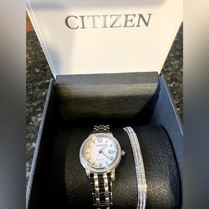 Women’s {BRAND NEW} Citizen stainless steel watch and bracelet set.